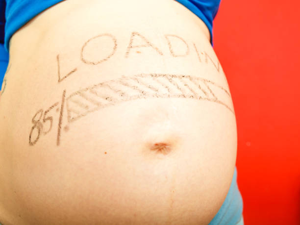istock Pregnant woman belly with drawings 858986052