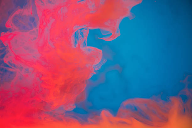 istock colorful smoke on blue background 858986774