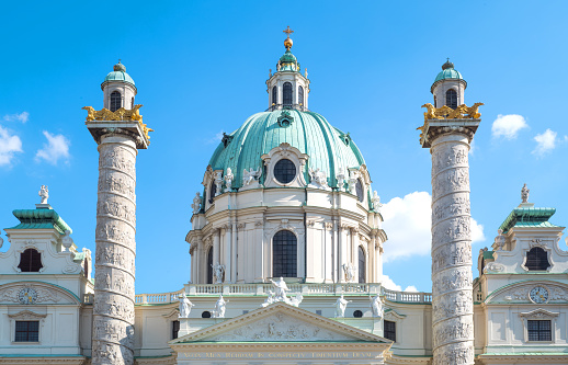 Vienna, Austria - August 7, 2016:  The baroque style facade of the Karls (St Carlo Borromeo) church