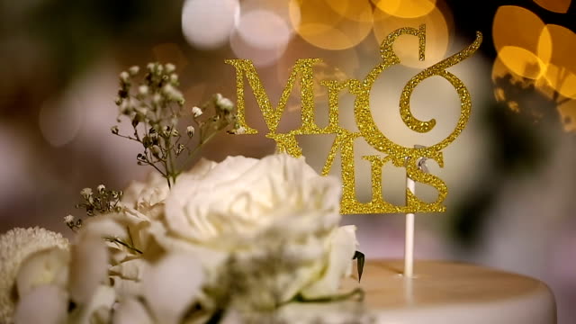 Beautiful wedding cake with Mr. & Mrs. sign