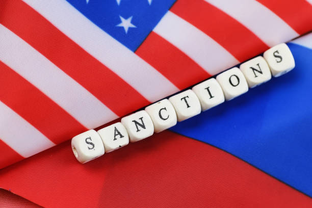 istock russian and usa flag sanctions 859001402