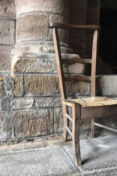 istock Brown chair against wall in church 859001738