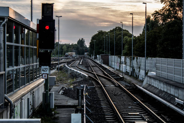 istock Railroad junction and signalization at dusk. 859002444