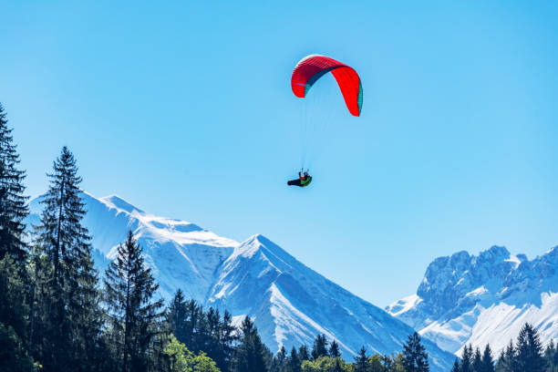 istock Paragliding with breathtaking Mountain Panarama / Bavaria 859006308