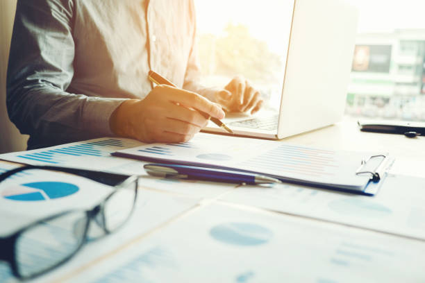 istock Typing laptop Business Man working with blank screen Planning Strategy Analysis Concept 859010494