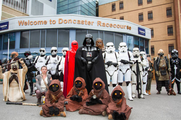 Doncaster Racecourse Monster Comic Con Doncaster Racecourse, South Yorkshire, UK - October 7, 2017.  A group of Comic Con characters from the Star Wars movie franchise standing at the entrance to Doncaster racecourse in South Yorkshire, UK whilst welcoming cosplayers to the first Monster Comic Con event doncaster photos stock pictures, royalty-free photos & images