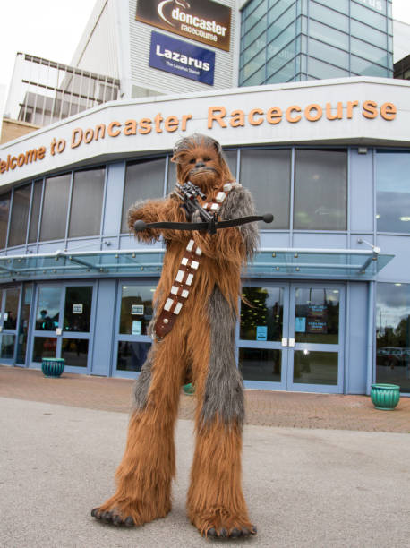 Doncaster Racecourse Monster Comic Con Doncaster Racecourse, South Yorkshire, UK - October 7, 2017.  A group of Comic Con characters from the Star Wars movie franchise standing at the entrance to Doncaster racecourse in South Yorkshire, UK whilst welcoming cosplayers to the first Monster Comic Con event doncaster photos stock pictures, royalty-free photos & images
