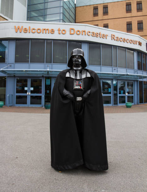 Doncaster Racecourse Monster Comic Con Doncaster Racecourse, South Yorkshire, UK - October 7, 2017.  A group of Comic Con characters from the Star Wars movie franchise standing at the entrance to Doncaster racecourse in South Yorkshire, UK whilst welcoming cosplayers to the first Monster Comic Con event cosplay character stock pictures, royalty-free photos & images