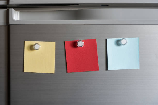 istock colorful magnet sticky notes on refrigerator door background 859017552