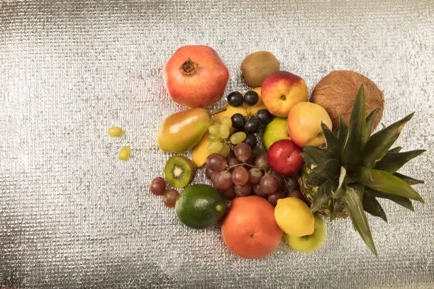 Photo of Assortment of exotic fruits isolated on white