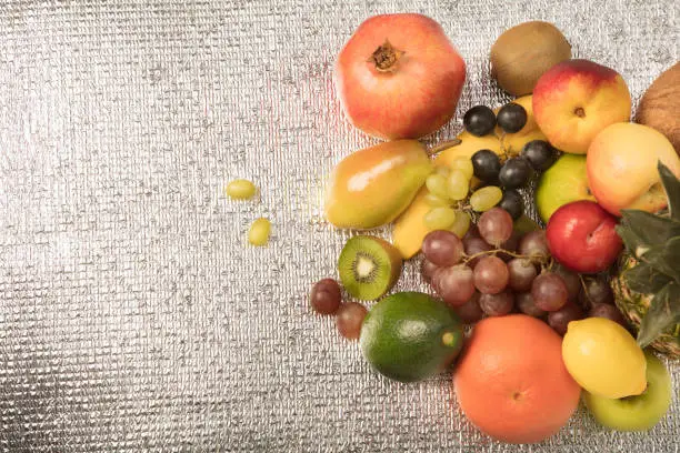 Photo of Assortment of exotic fruits isolated on white