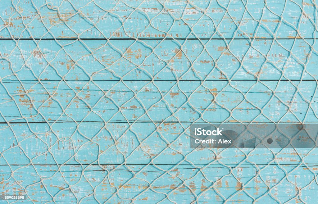 Pêche de texture net sur bois bleu clair, fond maritime - Photo de Fond libre de droits