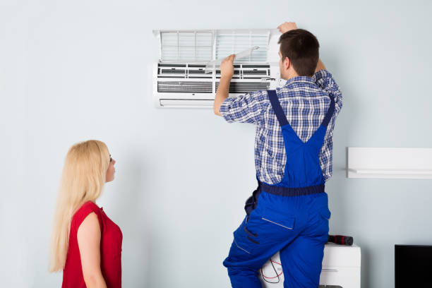 istock Technician Repairing Air Conditioner At Home 859031512