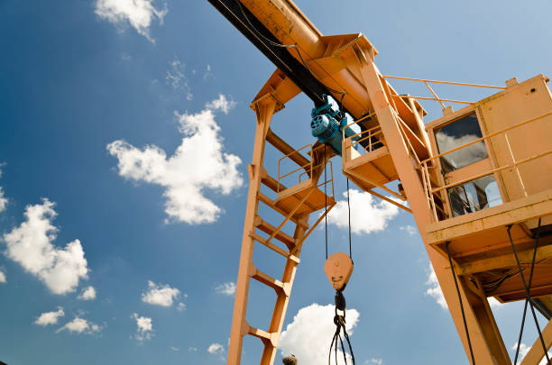 istock Big lifting crane in the factory 859032464