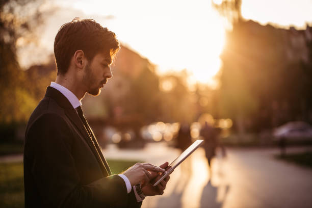 istock Young businessman with digital tablet 859036590