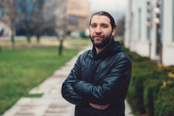 istock Mid adult man looking at camera 859039882