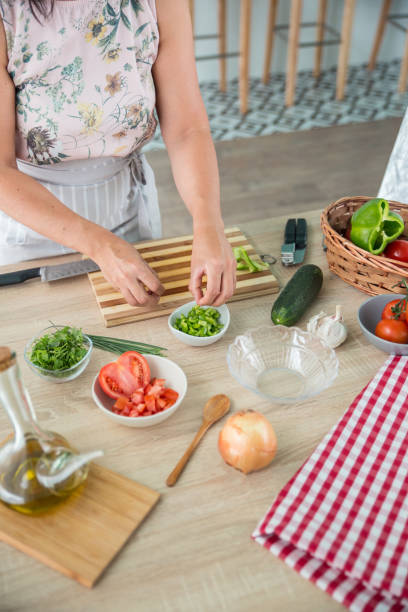 istock woman preparing a gazpacho 859043862