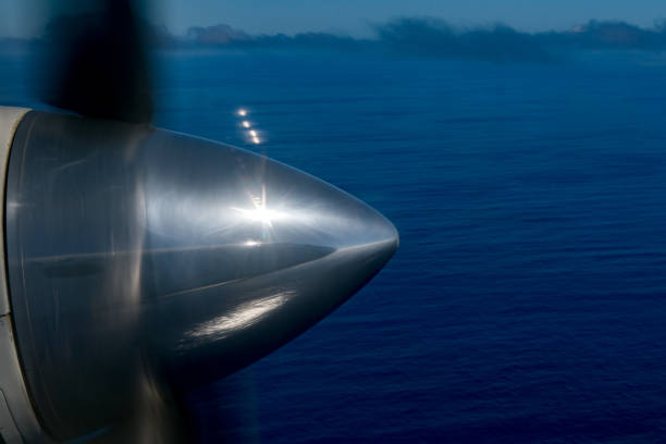 istock propeller airplane detail flying in tropical paradise 859052766