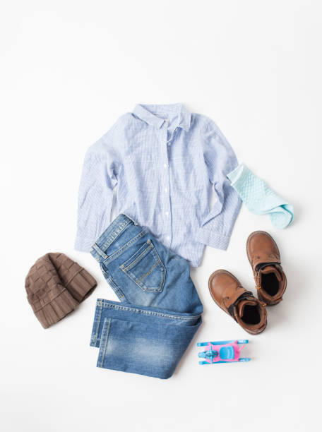 istock Shirt, jeans and shoes on boy on white 859058046