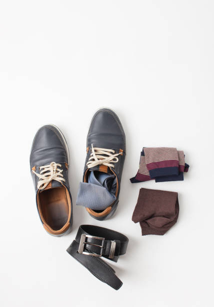 istock Men's shoes with socks and belt white 859058400