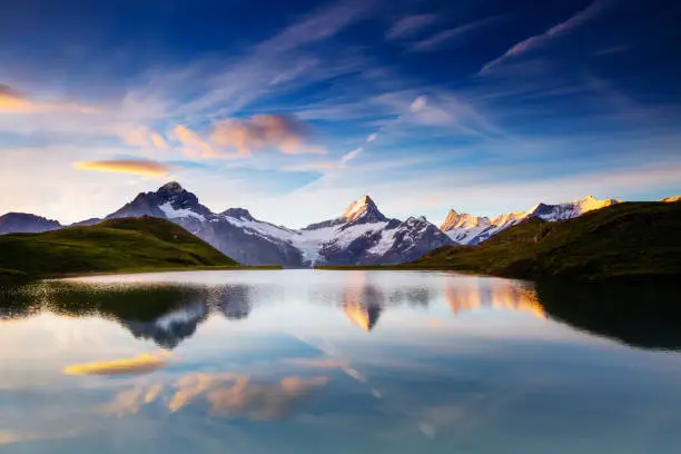 Photo of Location place Bachalpsee in Swiss alps, Grindelwald valley, Bernese Oberland, Europe. Beauty world.