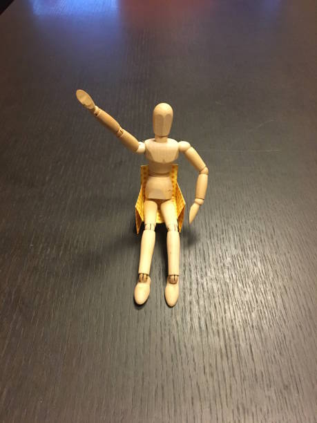 sezení v křesle origami - překonávání protivenství fotky - stock snímky, obrázky a fotky