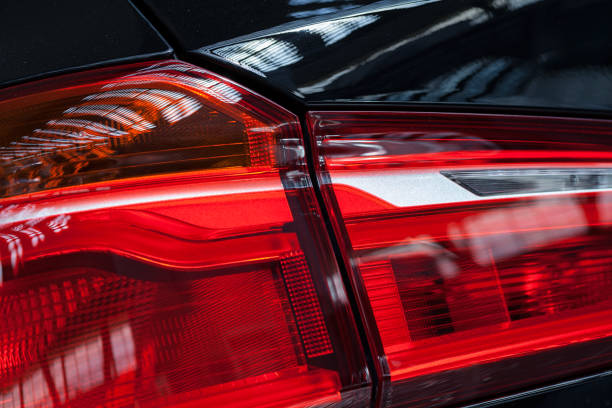 istock headlights under the reflection of lights 859072250