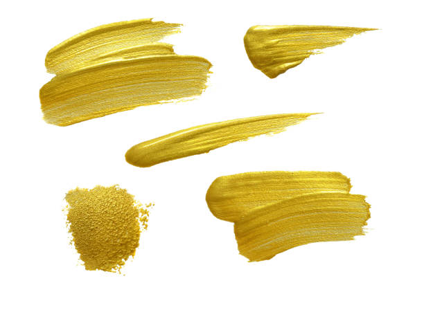istock Gold paint stokes isolated on white background 859073760