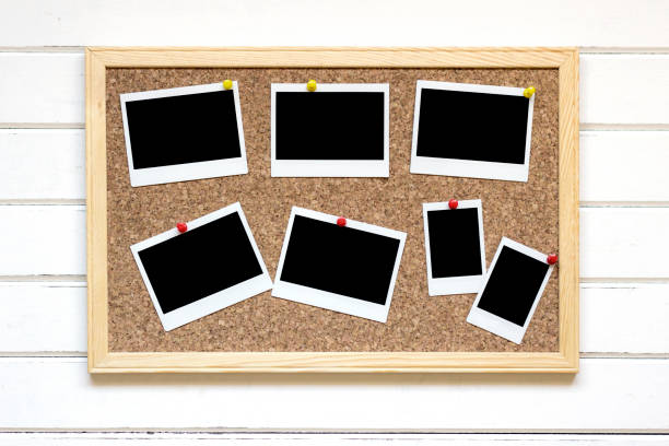 istock Instant pictures tacked to cork board 859074420