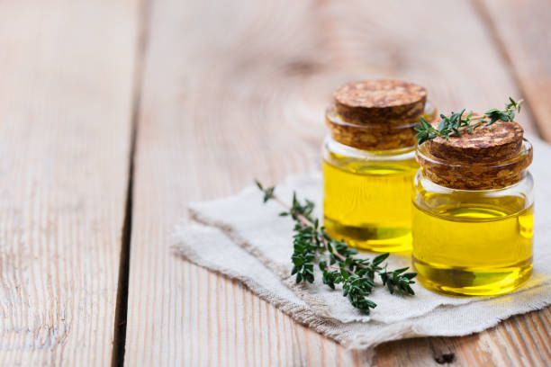 istock Organic essential thyme oil with green leaves 859076788