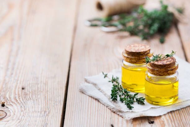istock Organic essential thyme oil with green leaves 859076922