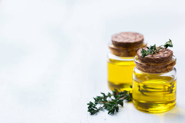 istock Organic essential thyme oil with green leaves 859076958