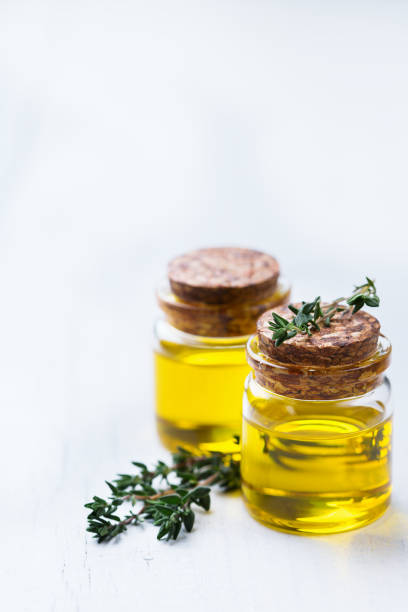 istock Organic essential thyme oil with green leaves 859076992