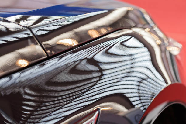 istock abstract brightness on the black car 859077190