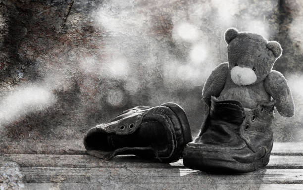 istock old scratched photo teddy bear monochrome 859079898