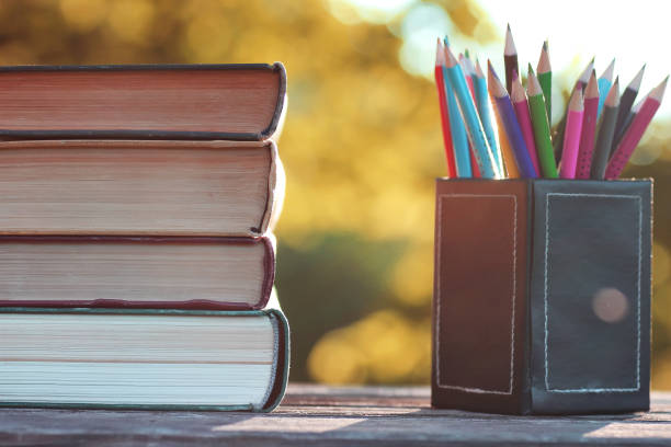 istock autumn book stack wooden outdoor 859080034
