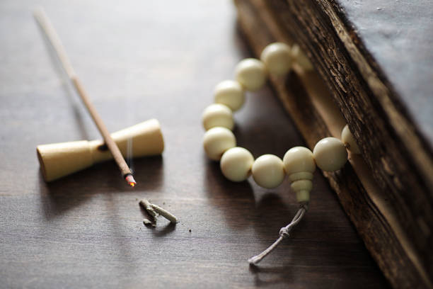 istock Beads and Incense on wooden table 859105084