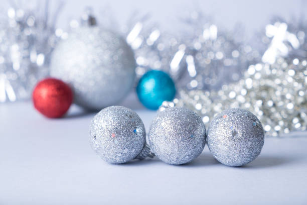 istock Christmas silver colored sparkling balls and decorations 859108288