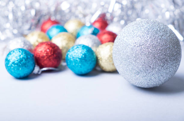 istock Colored christmas glittering balls and decorations 859108378
