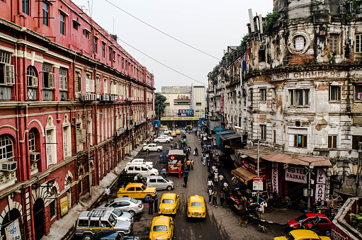 Streets of calcutta with the signature yellow taxi