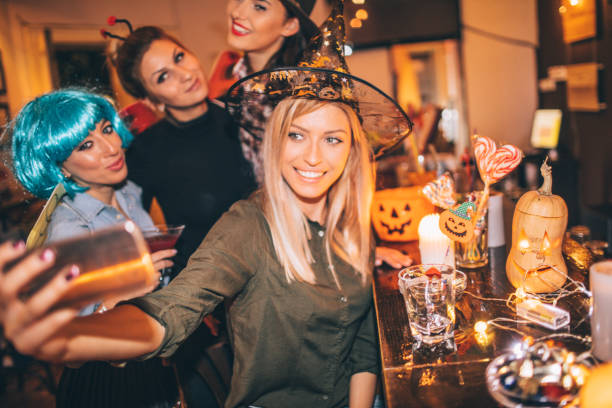 istock Girlfriends on Halloween party 859122258