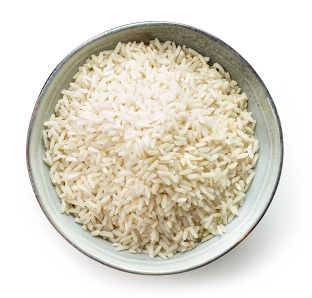 istock Bowl of raw long grain rice 859125526