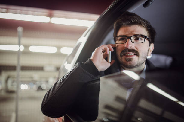 istock Businessman driving in car 859125644