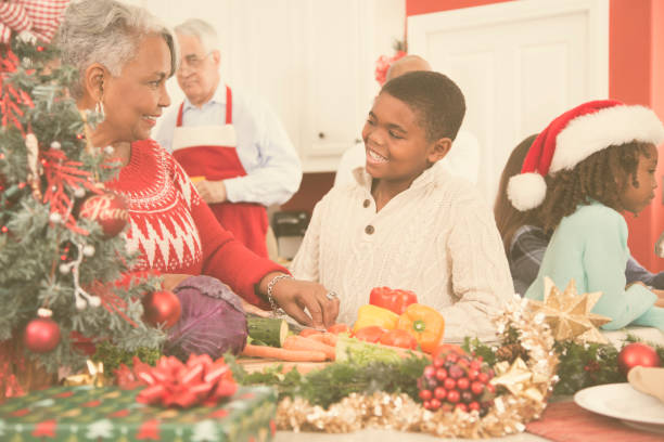 istock Multi-ethnic family in home kitchen preparing Christmas dinner. 859132584