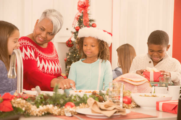 istock Multi-ethnic family in home kitchen preparing Christmas dinner. 859132848