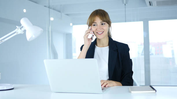 istock Young Female Talking on Phone, Attending Call at Work 859139404