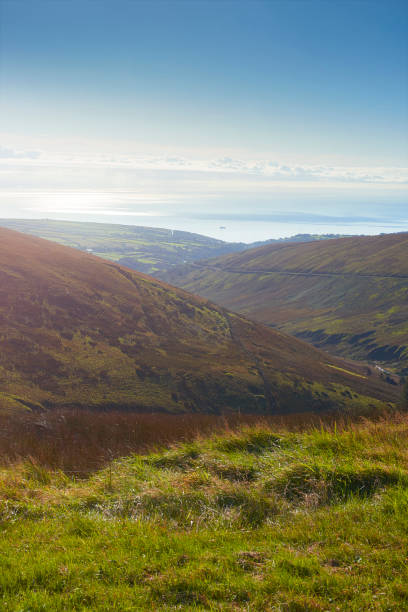 istock View out to sea from mountain 859142976