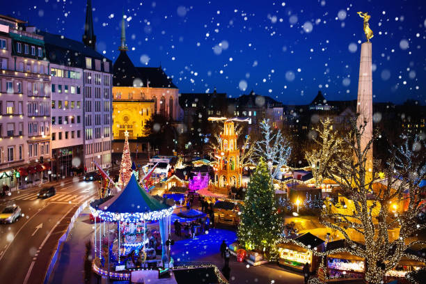 istock Christmas market. Winter fair with tree and lights. 859143762