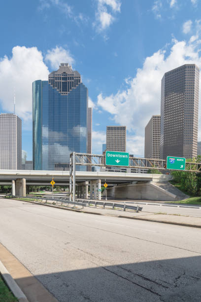istock Downtown Houston from Allen Parkway under cloud blue sky 859149344