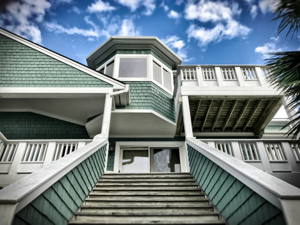 A large east coastal-style house set against the Intracoastal Waterway, at Wrightsville Beach, NC.
